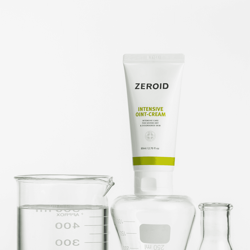 ZEROID Intensive Oint-Cream (80ml) posed on top of laboratory beaker
