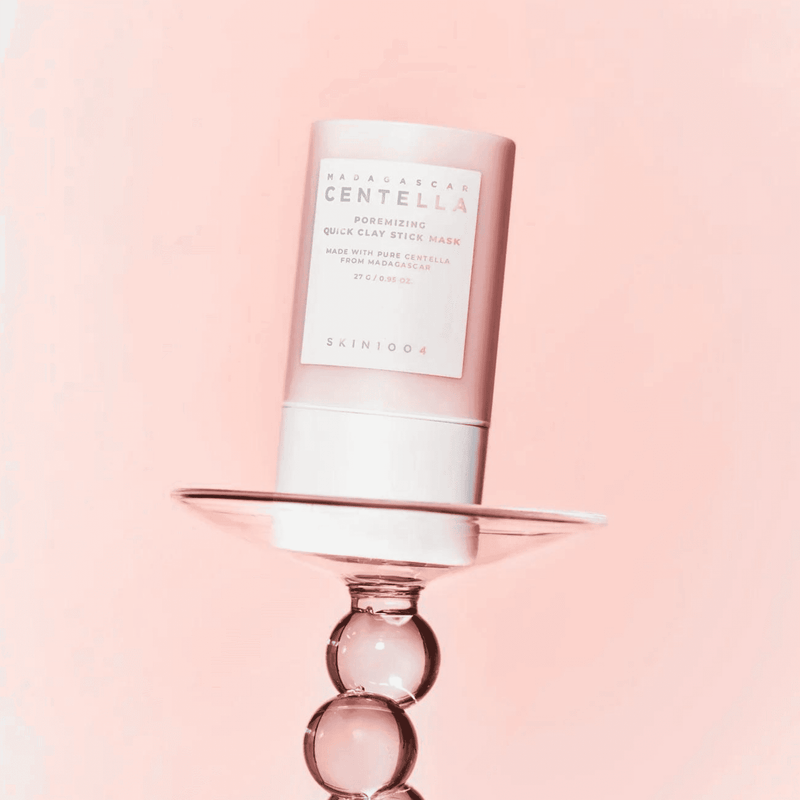 SKIN1004 Madagascar Centella Poremising Quick Clay Stick Mask (27g) in pink background